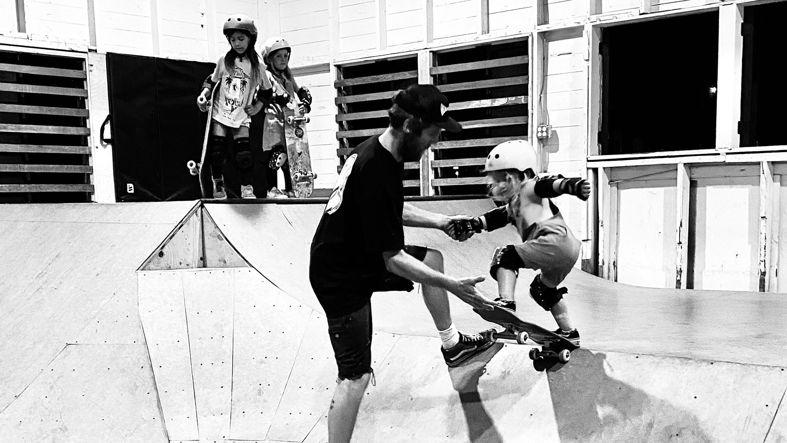 Young students dropping in with the help of an instructor